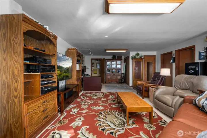 Door at far end of photo leads to stairway up to the main level...