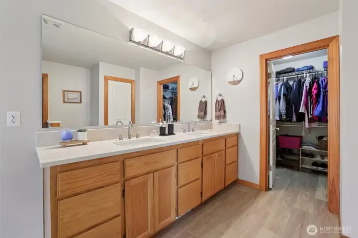bathroom with walk-in closet