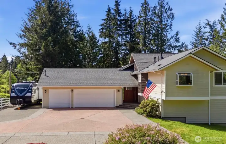 Large 3 car garage with abundant parking.