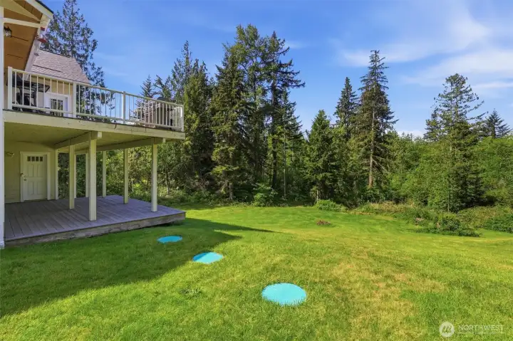 Sideview of house shows the lower patio.