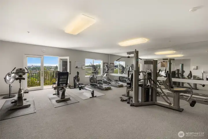 Fully-equipped penthouse gym—work out with an inspiring city view!