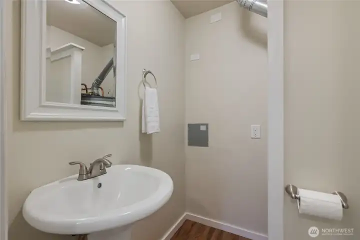 Powder room off of the kitchen