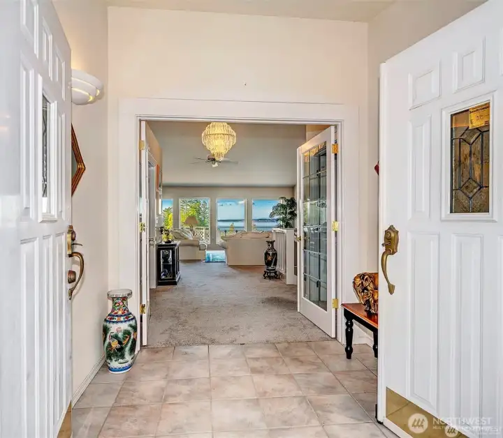 Tiled Flooring Entry W/ Double Doors.