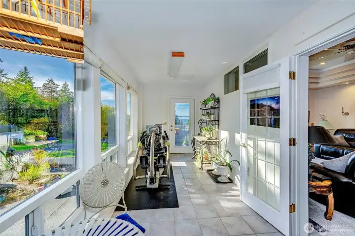 Sunroom Off The Kitchen & Family Room Area.