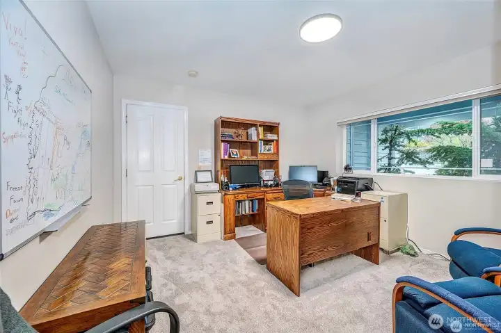 2nd Bedroom Upstairs w/ Door To Garage & Master Bathroom.