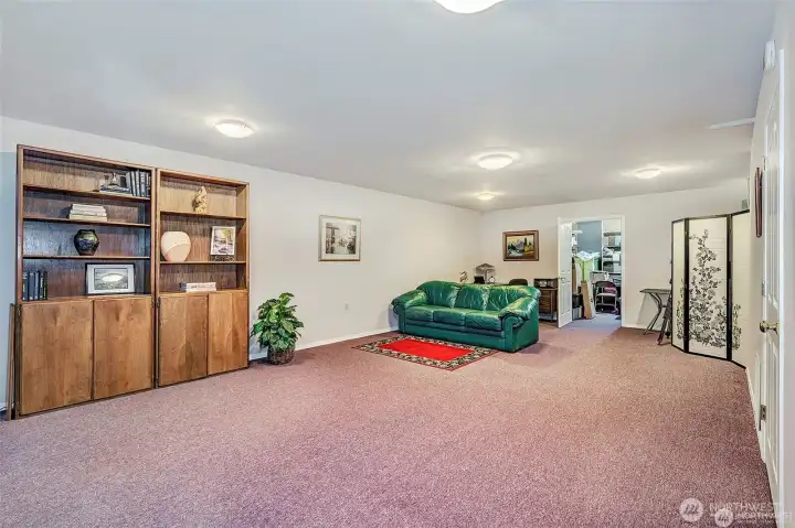 Extra Large Bonus Rooms Downstairs. Good Sized Storage Area That Leads To The Other 2 Car Garage.