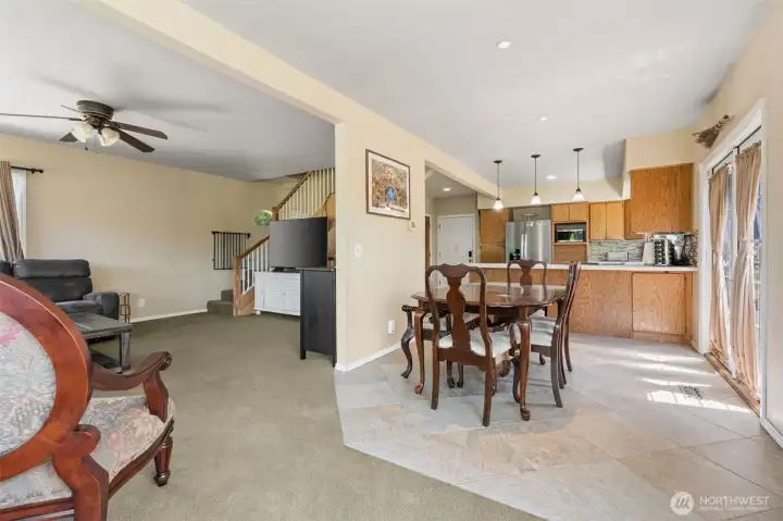 Living room, dining room, and kitchen are all open Living room, dining room, and kitchen are all open
