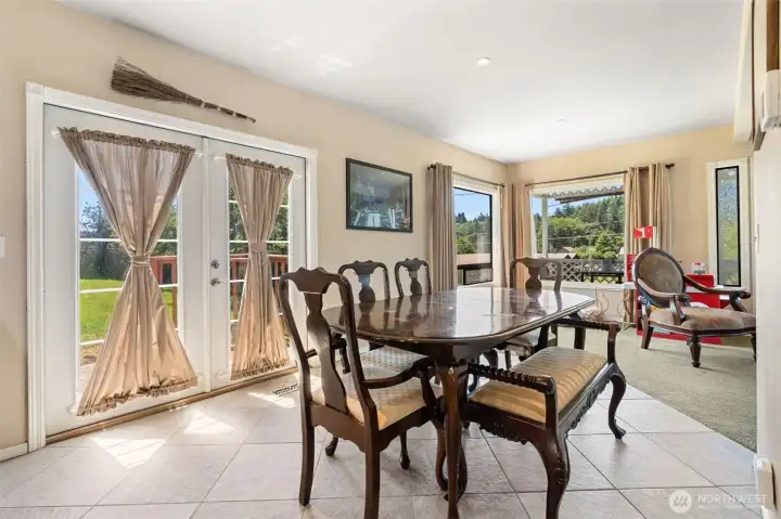 French doors lead to back deck and second lot area. French doors lead to back deck and second lot area.