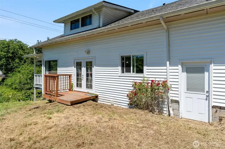 French doors lead to back deck and second lot area. French doors lead to back deck and second lot area.