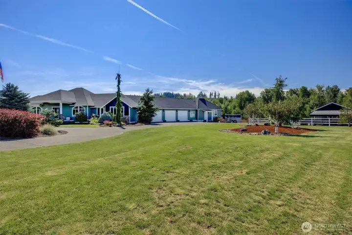 Three Car Garage for all the toys and cars! ADU on far right of Garage. Total Privacy from Main Home.