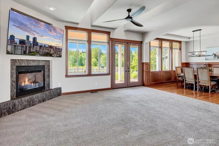 Woodwork throughout this home adds such a richness. Truly a Custom Home. French Doors open to the Large Deck and Back Yard.