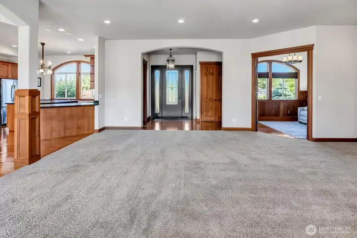 Entry with New Custom Front Door. 1/4 Bath on left and Coat Closet on right.