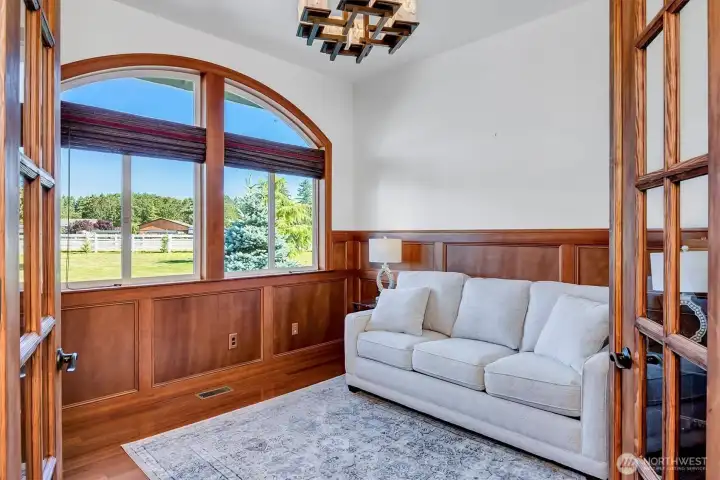 What a home office! Imagine your own treasures and desk set up to start your day at work. Or you could make it into a reading or music room with the French Doors that Close for privacy!
