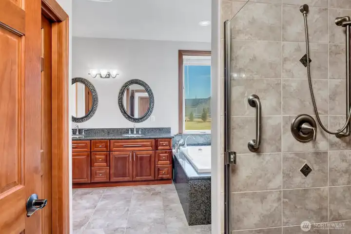 Primary Shower area on right and toilet is to the left, it has door that closes for privacy. This picture doesn't show the entire shower and how nice it is.