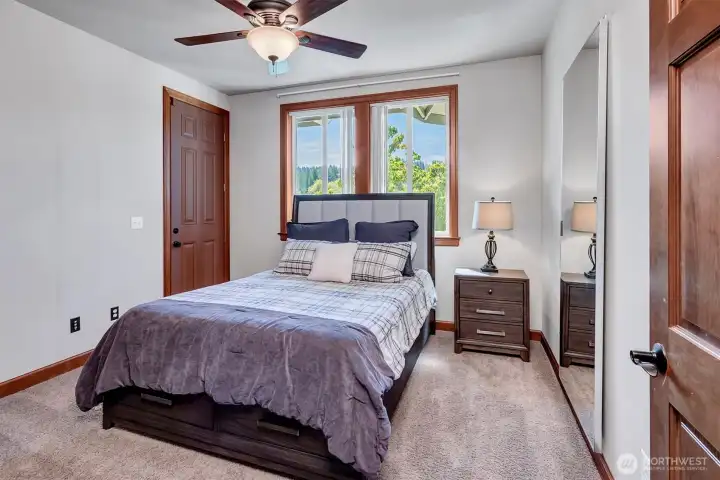 One of the Guest Bedrooms. Door on the left leads to the Deck and Backyard.