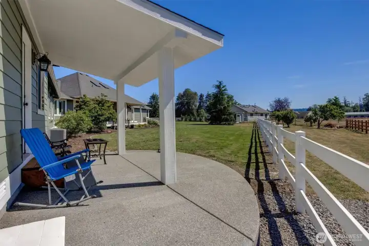 Private Porch for the ADU. Enough room for more seating and a BBQ! View of the Pasture.