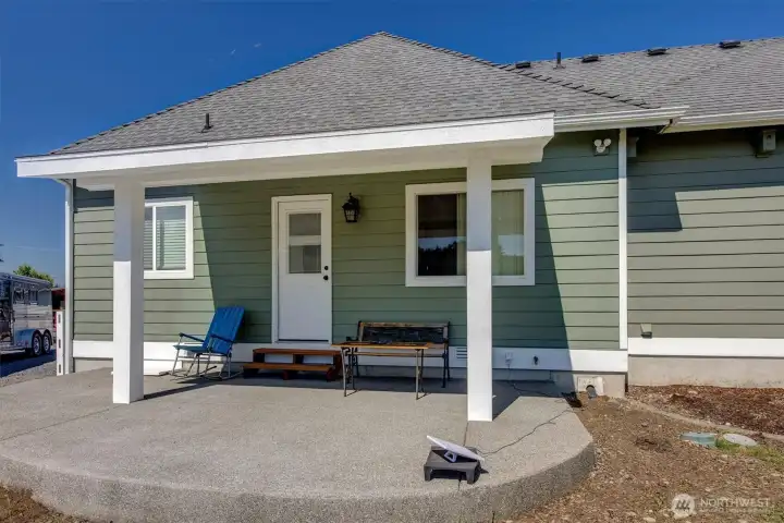 Porch for the ADU. Door leads into the Kitchen. Window on right is the Bedroom.