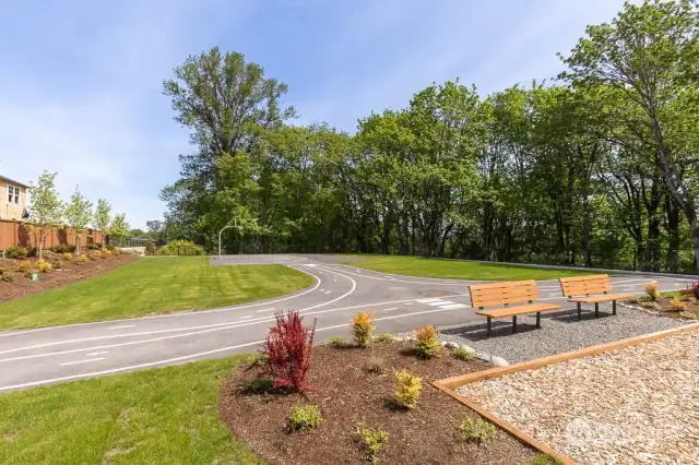 Community Park #2 has sports court, tricycle track and play structure.