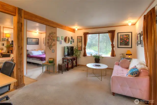 Charming one bedroom, full bathroom, washer/dryer, full kitchen apartment on the bottom floor.
