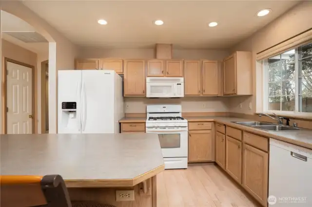 The kitchen has a well designed work space.