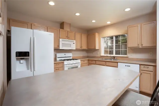 Great for prepping, baking, and socializing, this massive counter bar lends itself to multiple uses.
