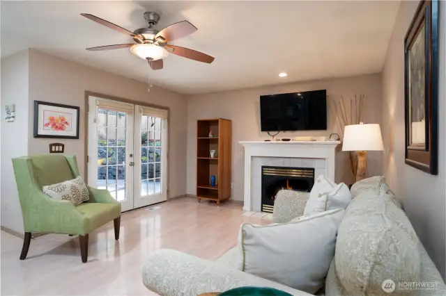French doors lead to a partially covered deck.