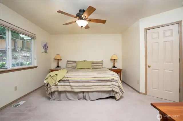 The primary bedroom is located behind double doors and is nice and spacious.  A walk in closet is found behind the single door.
