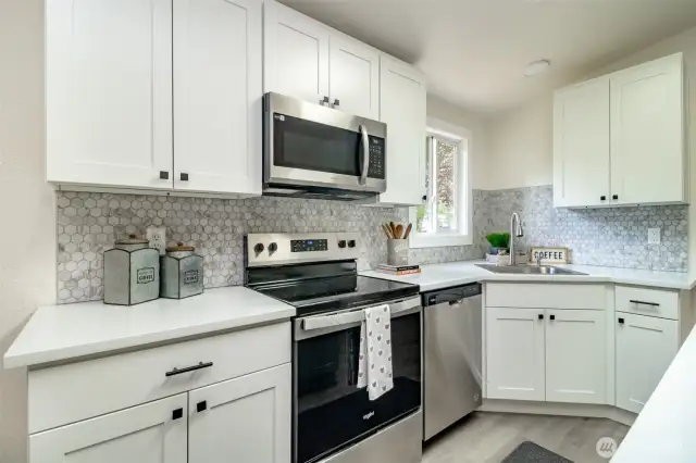 New quality cabinets and new stainless steel appliances.