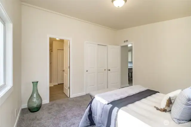 There is a spacious private bath with barrier free shower just ahead.