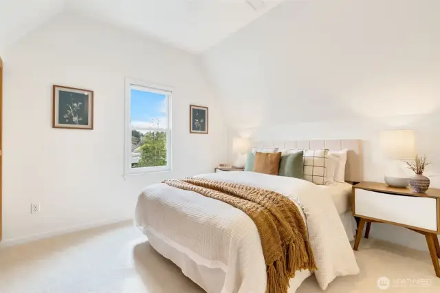 Proper primary bedroom suite with soaking tub and shower.