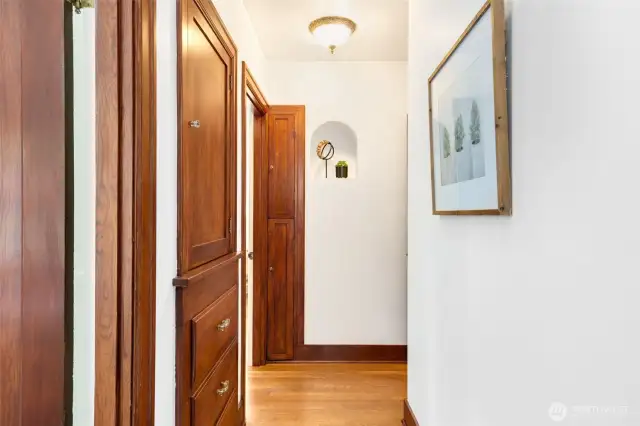 This lovingly maintained home gives you all the Tudor feels: drenched in mahogany, peek-a-boo door in pristine front door, arches, coves, lovely original millwork.