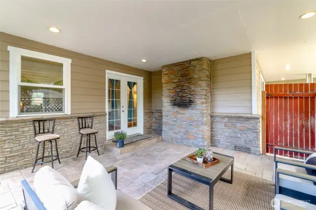 Covered outdoor patio great space for grilling, and relaxing.