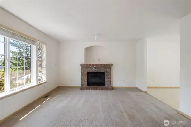 Upper level Living Room w/ gas-fired fireplace