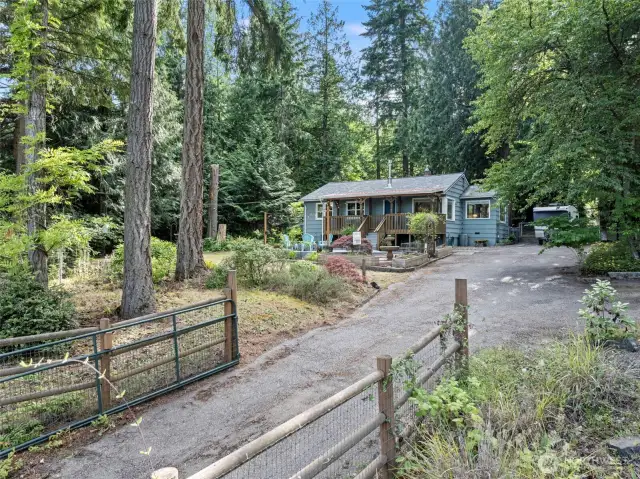 Lengthy driveway with turn around space