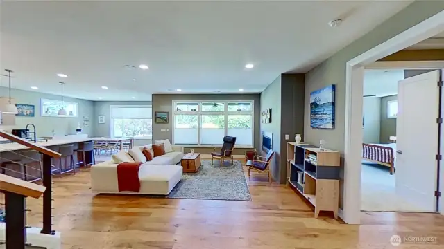 Open & light-filled great room floor plan with primary bedroom on the main level
