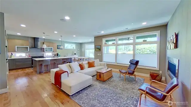 Great room with island kitchen and dining area