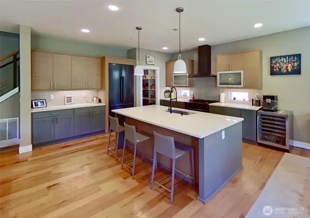 Stone countertops, newer stainless appliances, wine/beverage fridge, walk-in pantry