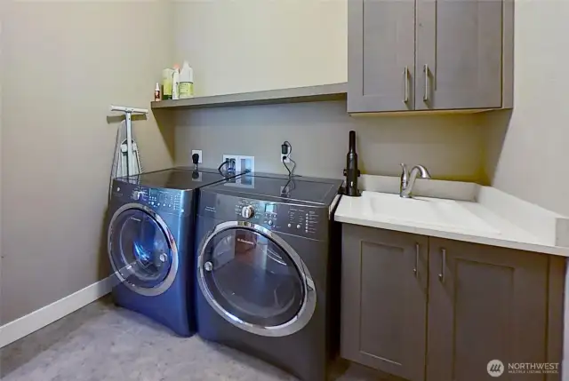 Spacious laundry room on main level.