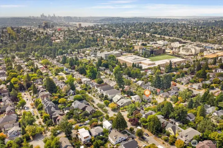 aerial photo looking south. You can see Lake Union and downtown Seattle from the photo. 98 walk score and 100 transit score! A short walk to light rail, grocery stores, cafes and everywhere you want to be. Only minutes to the UW, downtown, Amazon and 520. And located in the #1 sought after school cluster!