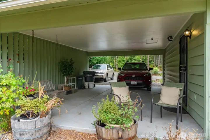 Carport parking and side entry.
