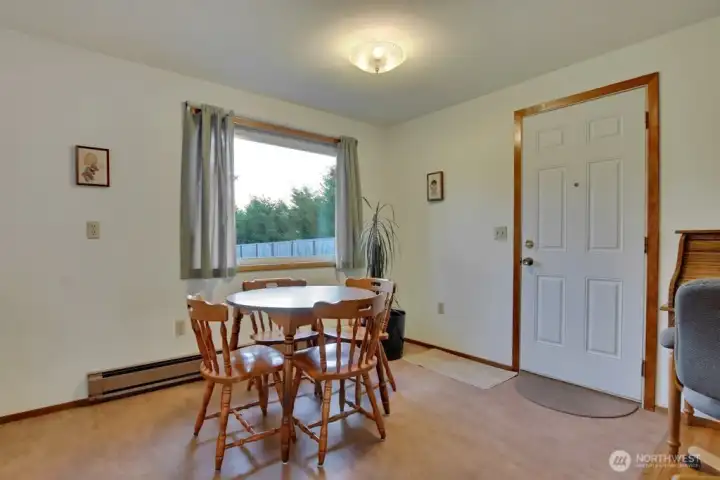 Door from carport leads into dining area.
