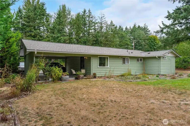 Back of the home and carport.