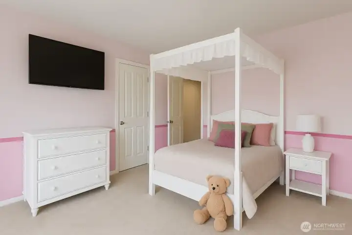 Virtually Staged 2nd bedroom on the 2nd level.The bedrooms are all good sized.