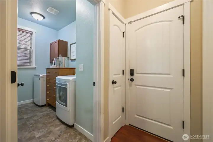Darling laundry room. Door to right goes to garage