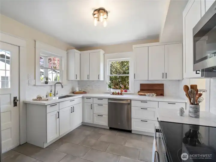 The kitchen has been beautifully remodeled.