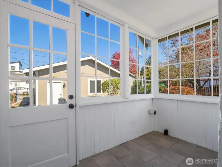 The sun porch is plumbed for washer and dryer.