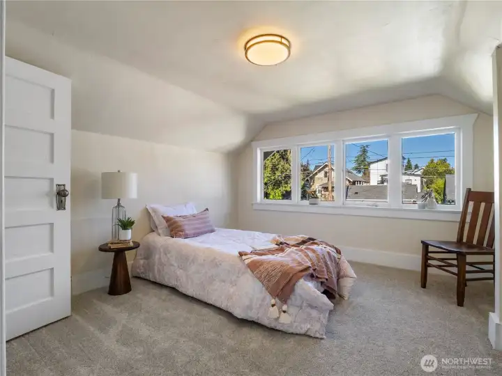 This is the second bedroom on the top floor facing the back of the home.