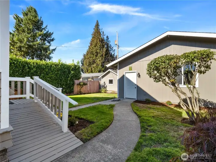 The back yard offers lushorivacy.