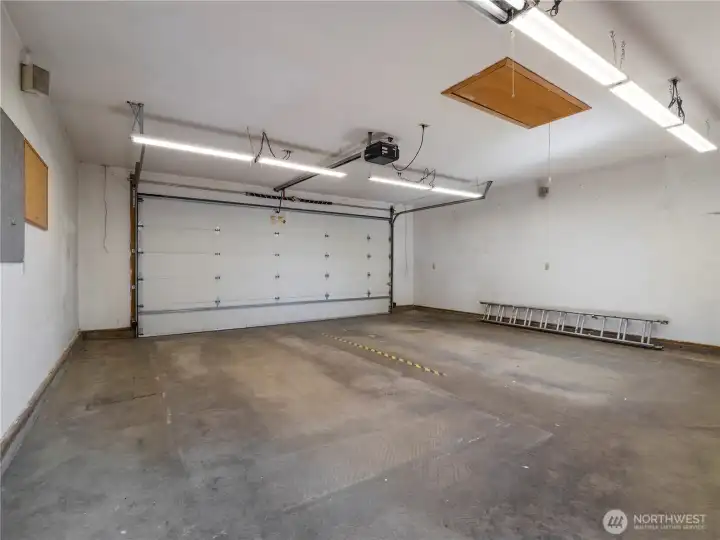 This is the teo car garage. It has ample room for two  cars and a work space.