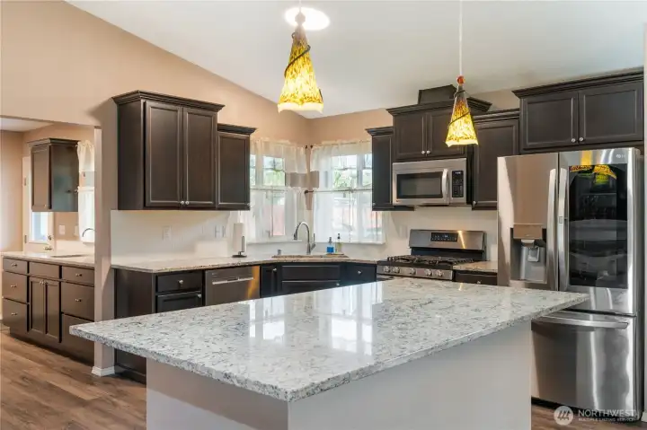 Just beyond the gleaming kitchen is the handy Butler's Pantry.